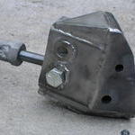 Front mounting bracket for axle trailing link