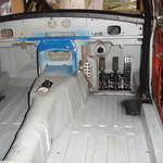 Footwell with pedals and clutch foot rest