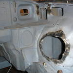 Exhaust cut out and washer bottle brackets at the